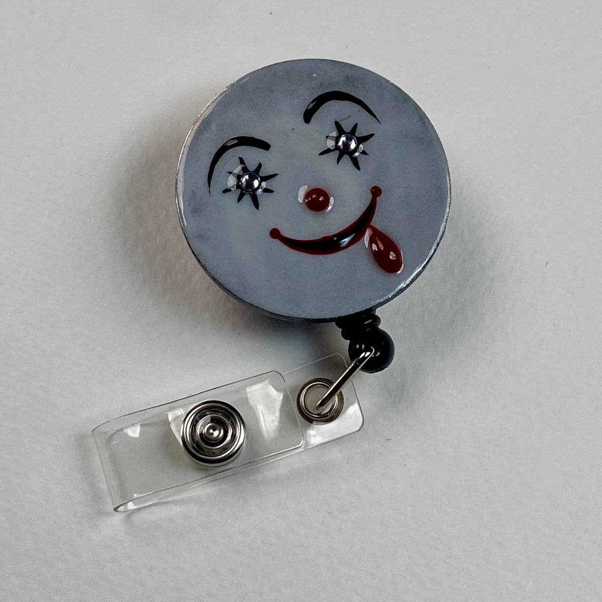 Creepy Smile Badge Reel – Handmade Horror Face Retractable ID Holder, Spooky Cute Badge Reel for Nurses & Teachers